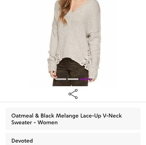 Ladies v neck sweater side detail size s